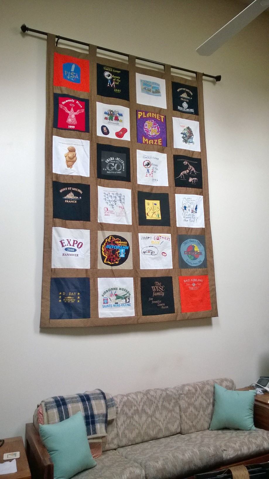 Memory Quilt with Sashing used as wall hanging